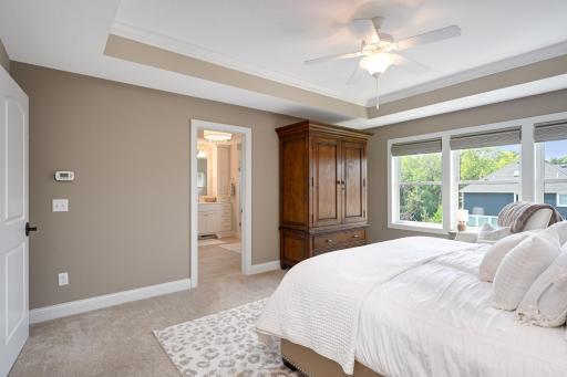 2nd shot of owner's suite leading to private ensuite bathroom