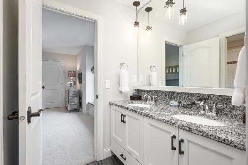 Jack and Jill full bathroom with granite and high end tilework