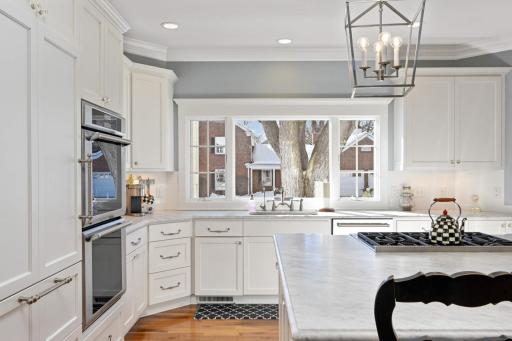 Large south facing window and honed Carrera Marble countertops