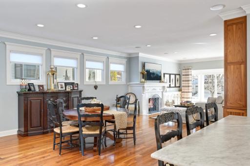 The spacious dining area is comfortable for daily dining and opens up for great entertaining with 5 buffet windows