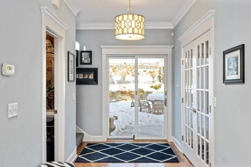 A sliding door flows right onto the paver patio