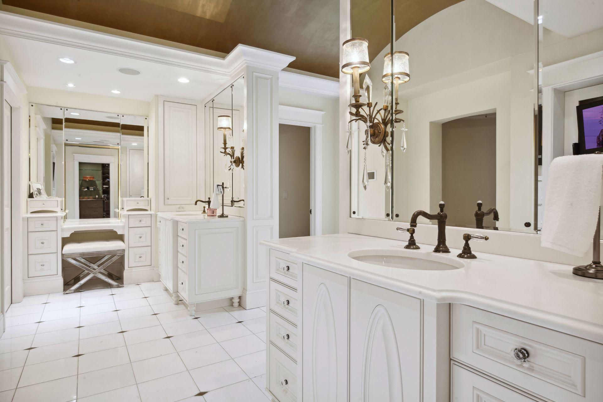 Deluxe Cabinetry / Carrera Marble Vanity Tops