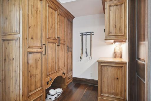 Back Hallway with Lockers & Walk-In Coat Closet