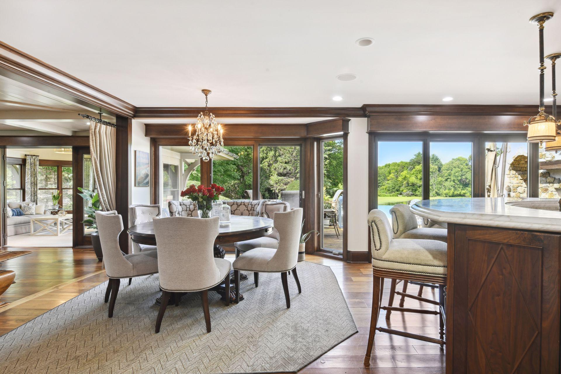 Walls of Windows Overlooking Private Backyard