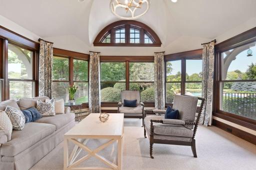 Beautiful Sun Rooms Overlooking Deck and Backyard