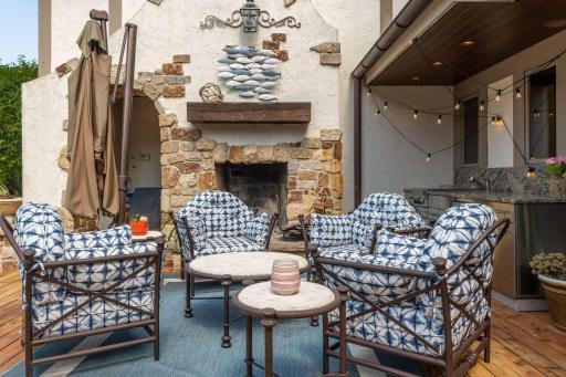 Fireplace Seating Area off Outdoor Kitchen