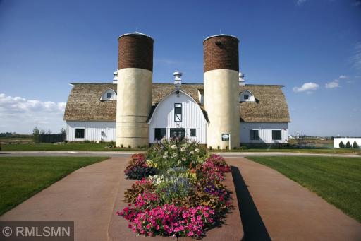 The Barn.... a One of a Kind Community Center. Offers gorgeous gathering spaces, kitchen, game and TV area, fitness room, pool and zero entry pool, park, basketball, sand volleyball and more!