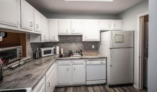 Bright kitchen with plenty of usable counter space!