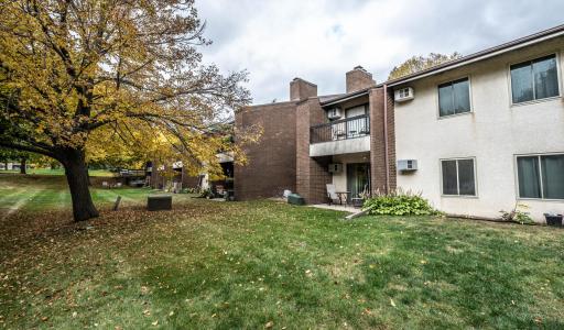 Another view of the walk-out patio and greenspace.