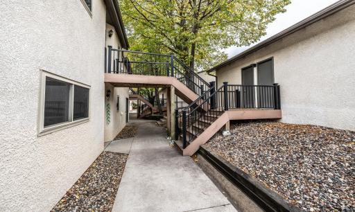 Opposite view of the courtyard walkways. Association dues also cover shoveling of the garage stairs/decking and the walkways!