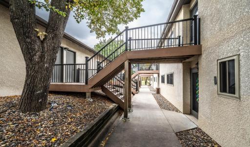 Courtyard walkway to the front entries into the units. The first door on the right leads to 1523 Millpond.