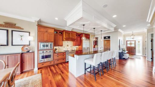 Kitchen has Cambria counter tops with travertine backsplash.