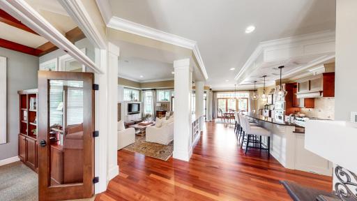 Floor is solid Brazilian walnut hardwood. Ceiling on main-level is 10' with 11' trey ceiling in living room.