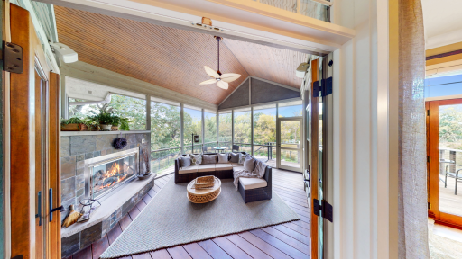 Cedar flooring with a 14' cathedral ceiling made of solid tongue & groove boards.