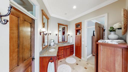 Cherry hardwood cabinetry & solid 4-panel birch doors