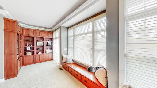 Built-in cherry hardwood bench for viewing