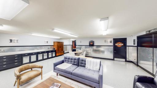 In-floor radiant heating in Flex room with lots of Diamond Steel Plating cabinets & counter top/work bench