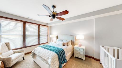 Bedroom (15' x 12') with Hunter Douglas room darkening window coverings & ceiling fan