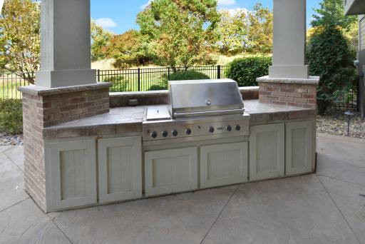 Outdoor gas patio grill with storage cabinets & counter space