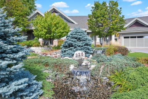 Home has three waterfall features in front of home for amazing curb side appeal.