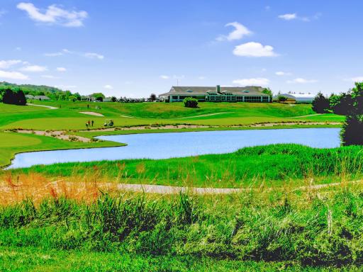 Troy Burne Golf Club House & pond with the 10th fairway
