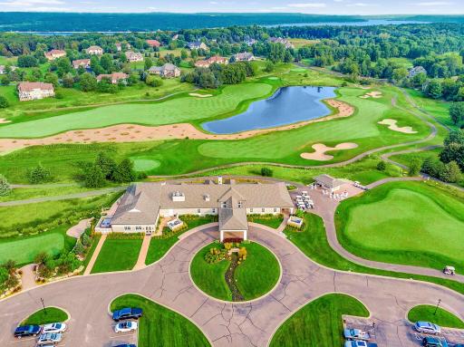 Troy Burne Golf Village Club House with Pond