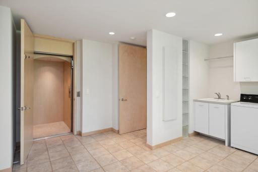 Elevator access is found here and opens in the walkout level.