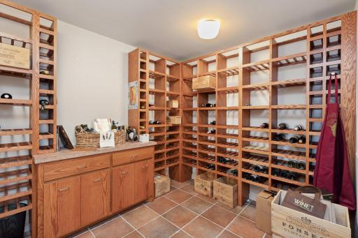 Grab a bottle of wine from the earth-cooled wine cellar, but not until you retreat to the bonus room (under garage spancrete area) to get a daily dose of exercise!
