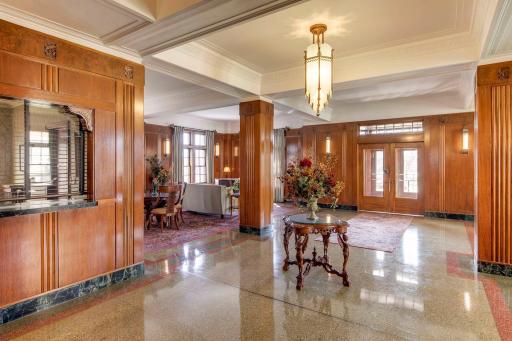 Art deco style front lobby featuring walnut, gum tree and poplar wood accents. marble