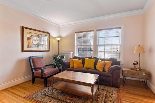 Comfortable and cozy- this home shows pride with its pristine original oak hardwood floors.