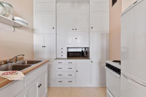 Original cabinetry freshly painted inside and out.