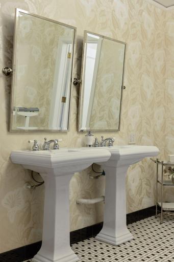 Public restrooms near the party room are vintage and boast original fixtures and tile.