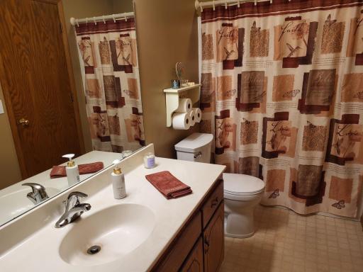 Clean upper level bath off both bedrooms and the living room.