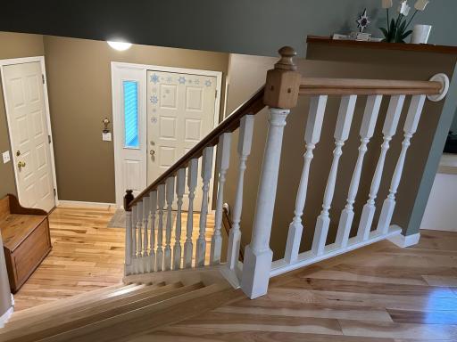 Photo for 4936 Campanaro Lane, White Bear Lake, MN 55110 - Listing #6267015 Painted railings are a nice compliment to the hickory wood floors!
