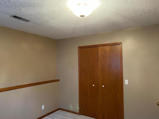 Photo for 4936 Campanaro Lane, White Bear Lake, MN 55110 - Listing #6267015 Double closet doors in lower level bedroom. This room could also be used as a craft room or office.