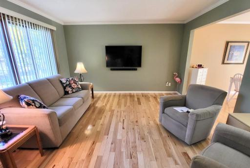 Photo for 4936 Campanaro Lane, White Bear Lake, MN 55110 - Listing #6267015 Beautiful living room features again an awesome hickory wood floor! The flat screen t.v. stays!