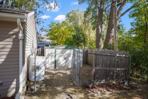 Photo for 8241 30th Avenue N, Crystal, MN 55427 - Listing #6267042 Storage Shed, Dog Kennel (or Chicken Coop?), and Rain-Catching System!