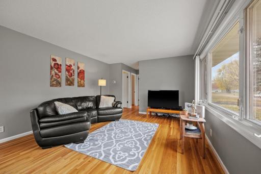 Photo for 8241 30th Avenue N, Crystal, MN 55427 - Listing #6267042 Welcoming Living Room with gorgeous hardwood floors