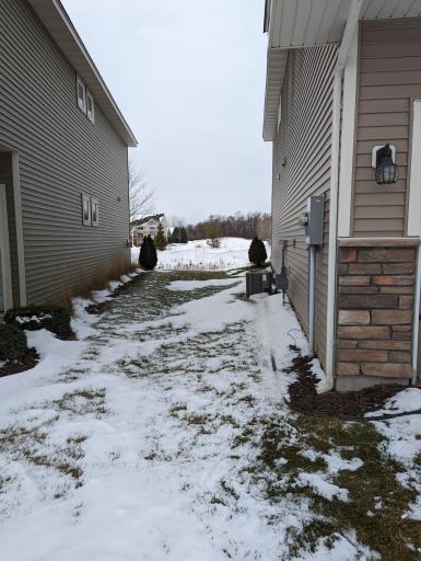Photo for 12422 Alamo Street NE, Blaine, MN 55449 - Listing #6267681 Winter Photo - wide space between the homes.