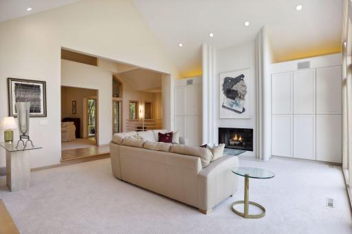 Vaulted ceilings, full wall of built-ins, fireplace, new carpet