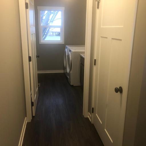 View of the main level entry with view of the laundry room - similar model home
