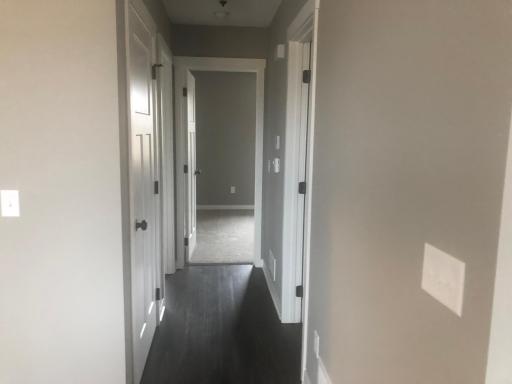 Similar model home hallway to bedrooms and bathroom