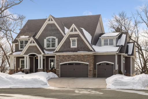 Stunning 3 level home, plus lower level walkout level on beautiful, .47 acre, private MN River Bluff site