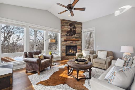 4 season sun room with gas fplc. and ceiling fan
