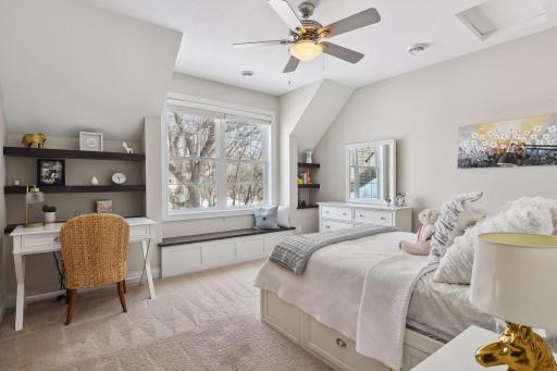 2nd bedroom w/window seat and ceiling fan. Room for a desk!
