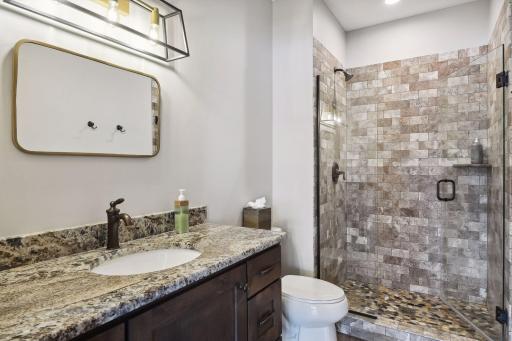 Lower level 3/4 bath with walk in shower.