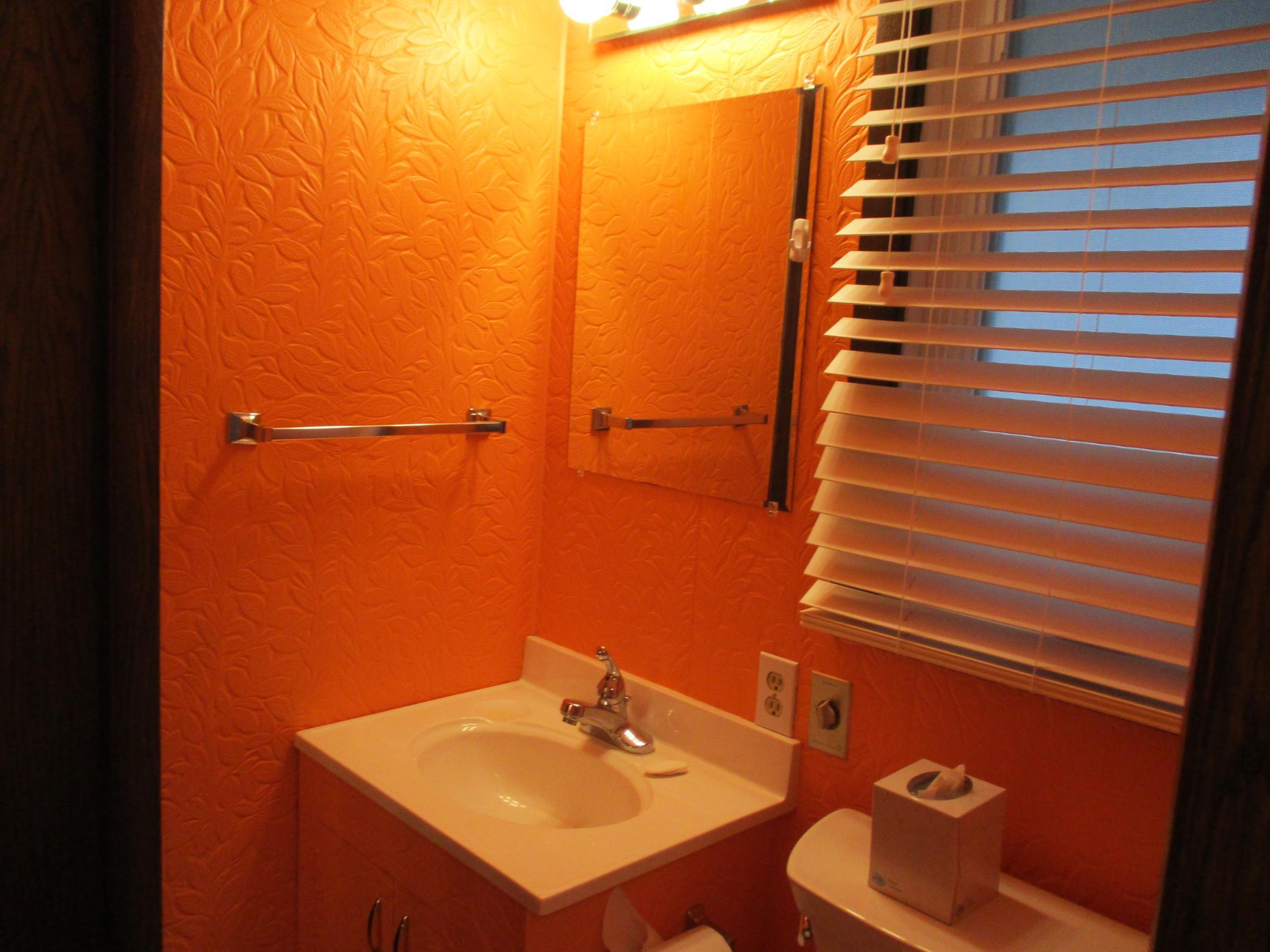 22. Half Bath off master bedroom & entrance to home.JPG
