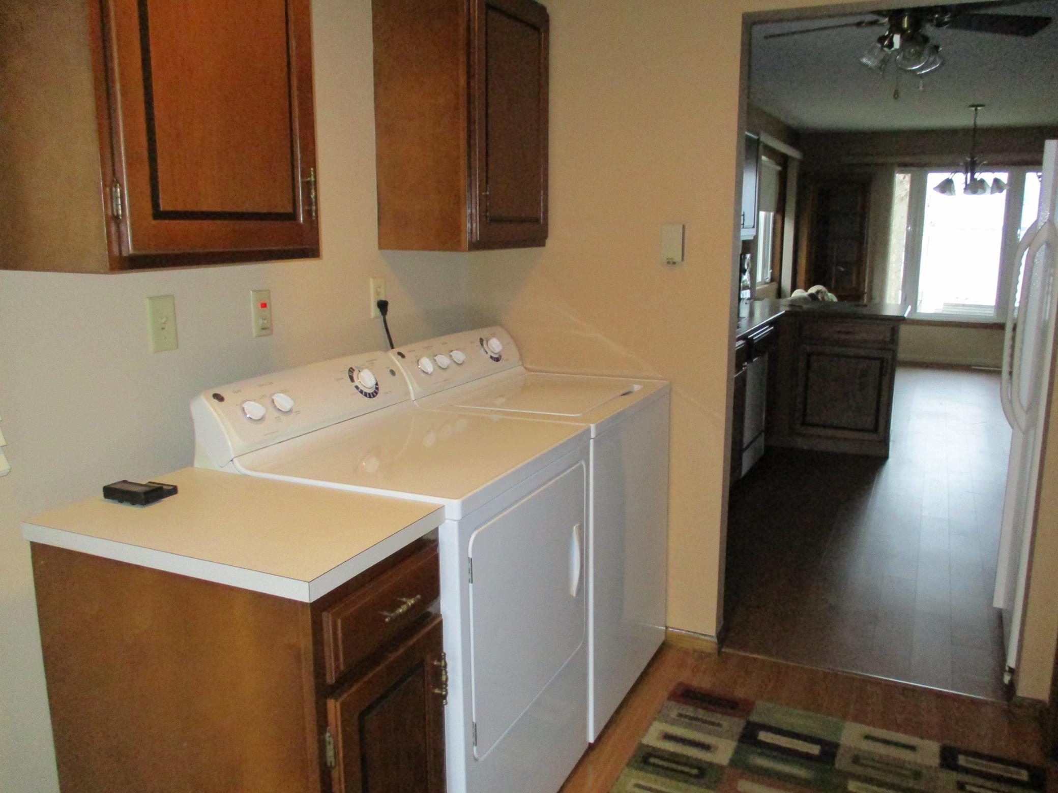 26. Laundry room off kitchen.JPG