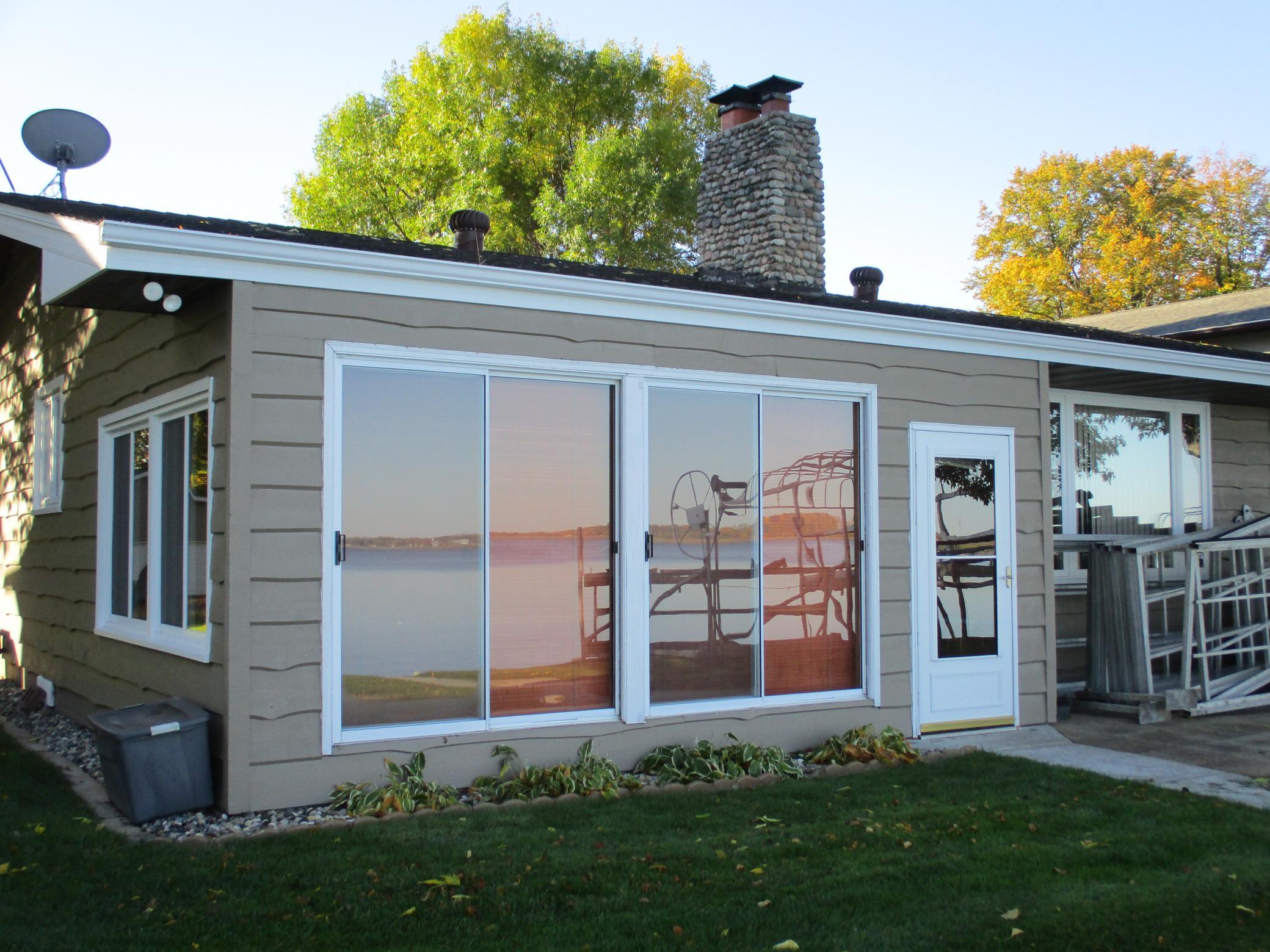 8. Patio doors off lakeside sunroom.JPG