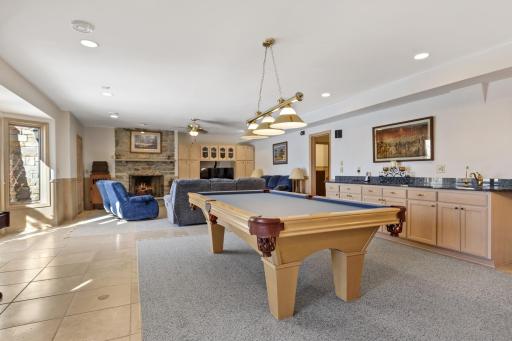 Family Room has Lots of Natural Light Including Two Sets of Double Doors to Outdoor Patios. Perfect for Entertaining.